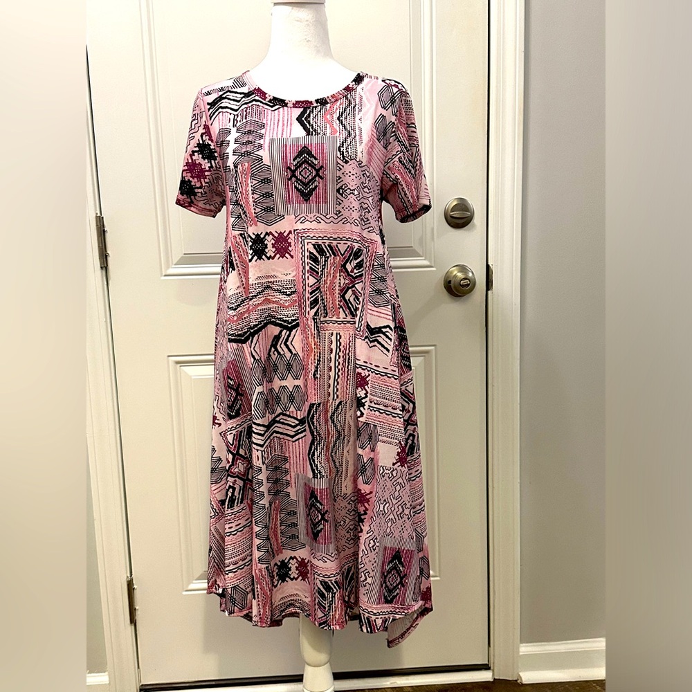 LuLaRoe Carly high low dress. Purple/lilac/deep pink ‘Aztec’ pattern.